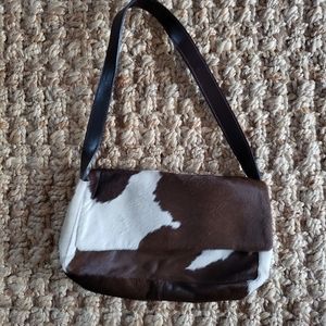 Genuine cowhide and leather purse.
